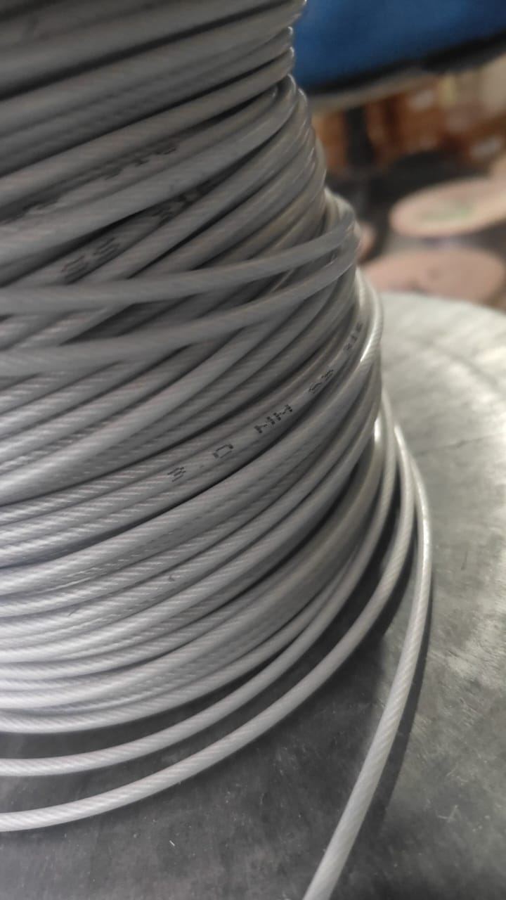 Coil of nylon-coated stainless steel wire rope used for invisible grills